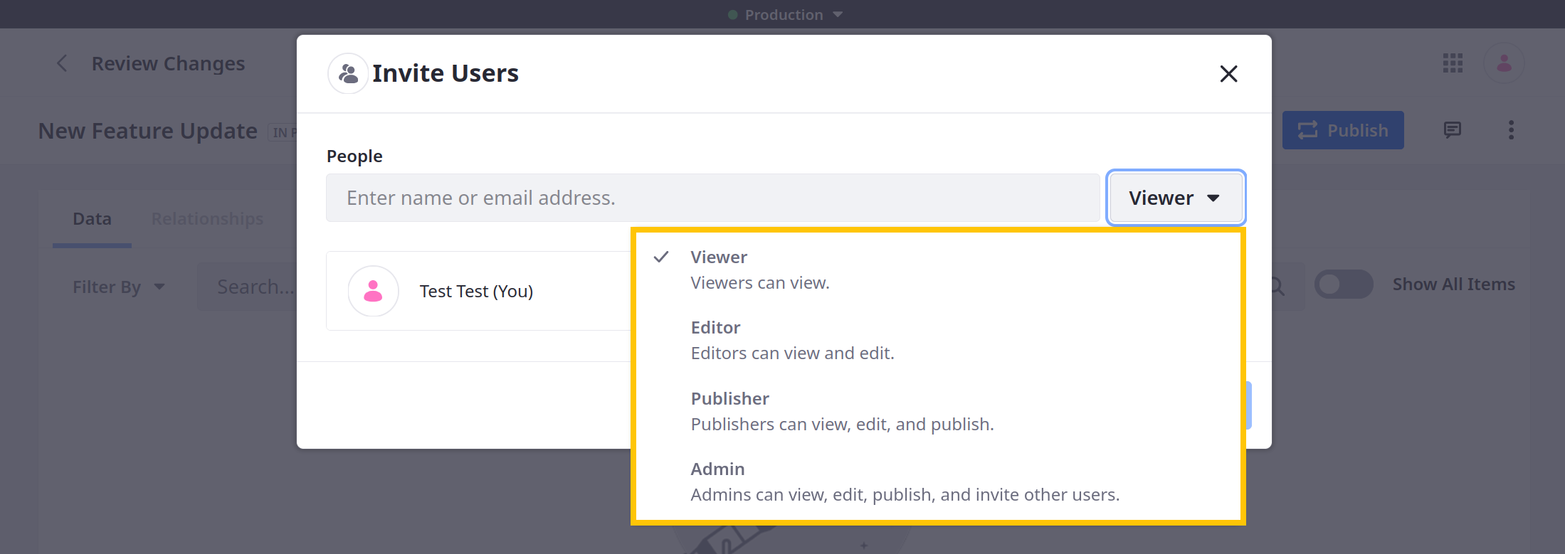 When inviting users to a publication, you can assign a role scoped to that publication.